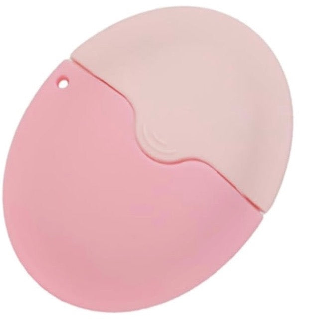 Pink portable sunscreen applicator