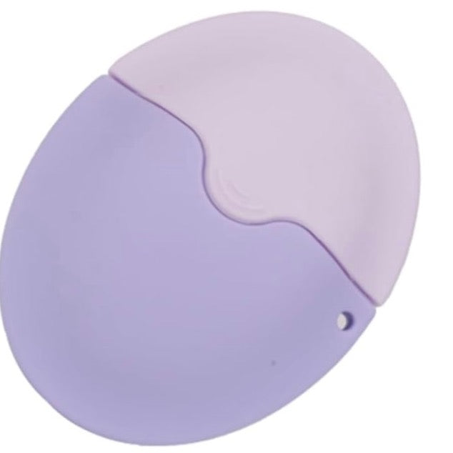 Purple portable sunscreen applicator